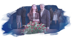 A grieving couple stands in front of a closed casket