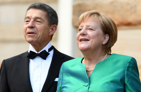 Иоахим Зауэр и Ангела Меркель.