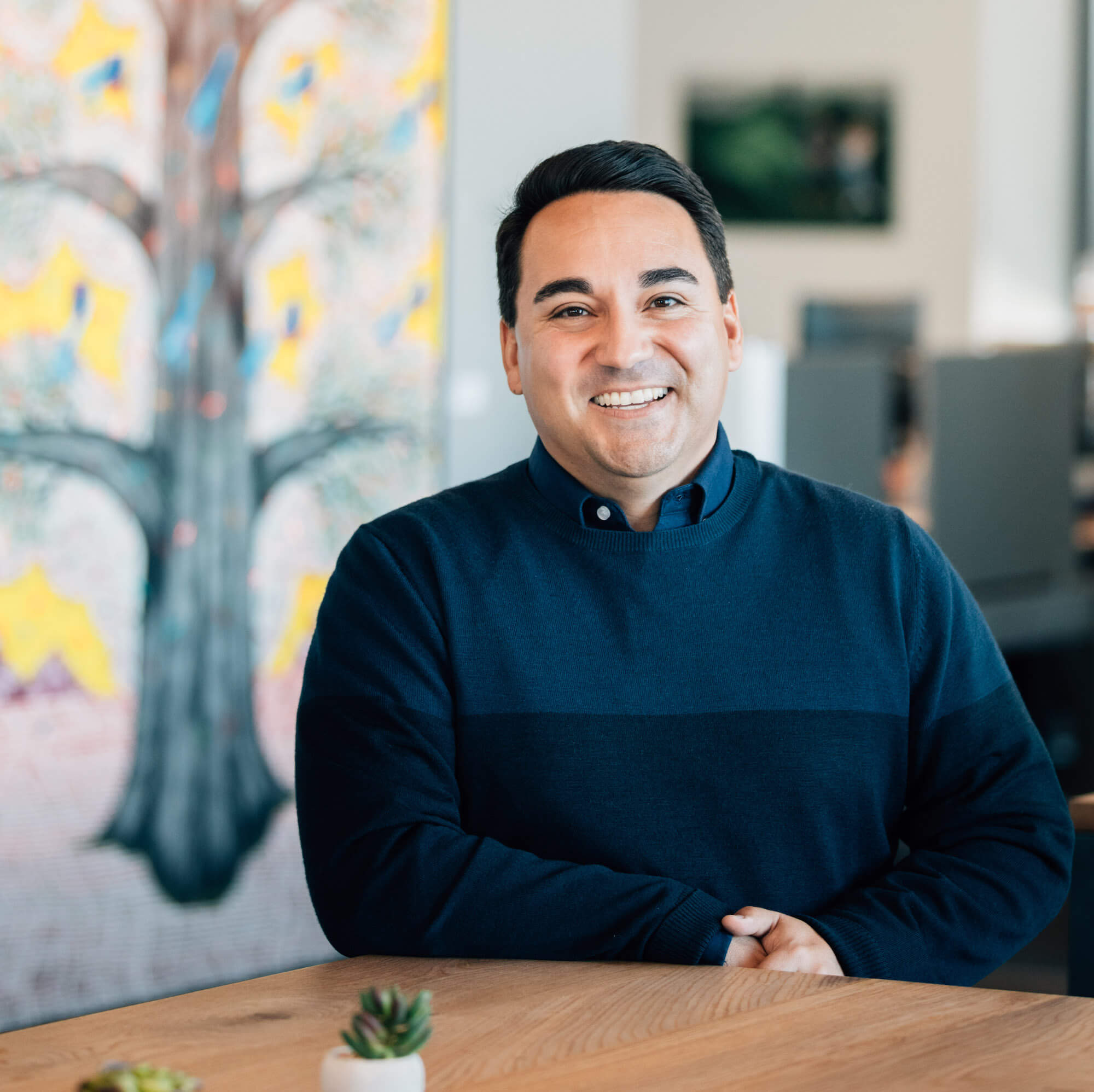A portrait of Mike Troncoso, the Vice President and Head of the Justice & Opportunity Initiative at the Chan Zuckerberg Initiative