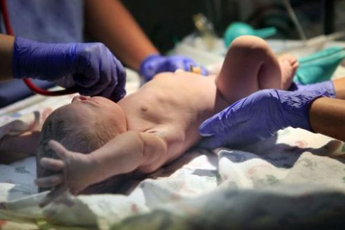 Новорожденный младенец