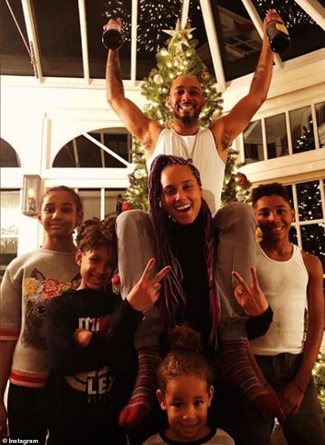 Children: Swizz (pictured with Alicia) has two children with the singer: Egypt (second from left), seven, and Genesis (front), three. He also has a daughter named Nicole (left), 10. His son with Mashonda, Kasseem, is pictured right