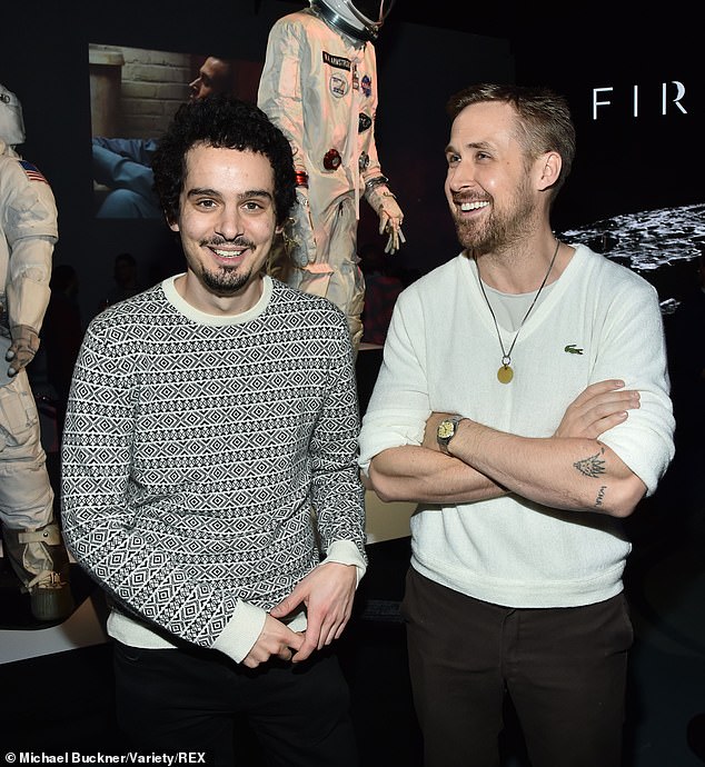 Laughing it up: Ryan with First Man director Damien Chazelle for a special screening in late November in LA