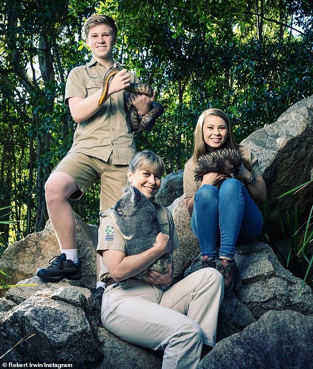 Family time! It appears that American-born Chandler is spending the holidays with girlfriend Bindi and her family. Pictured left to right:   Robert Irwin, Terri Irwin, Bindi Irwin