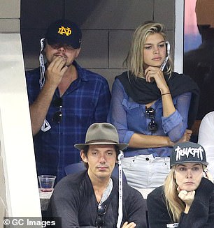 Pictured above with model Kelly Rohrbach who he dated until she was 25