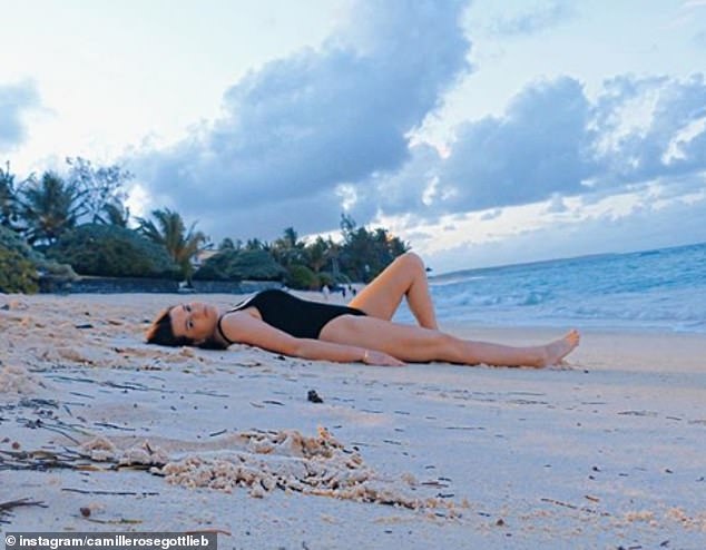 Sunny escape: The 21-year-old shared this photo of her lying on a deserted beach in Mauritius in April 2019. She spent lockdown with her mother and sister at home in Monaco
