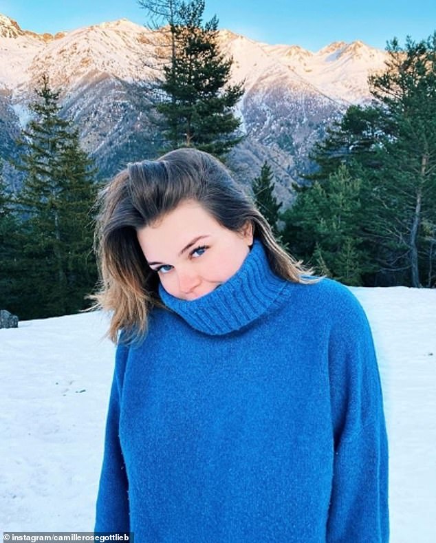 True blue: Camille showed off her eyes in this jumper in a photo taken in the Alps in January