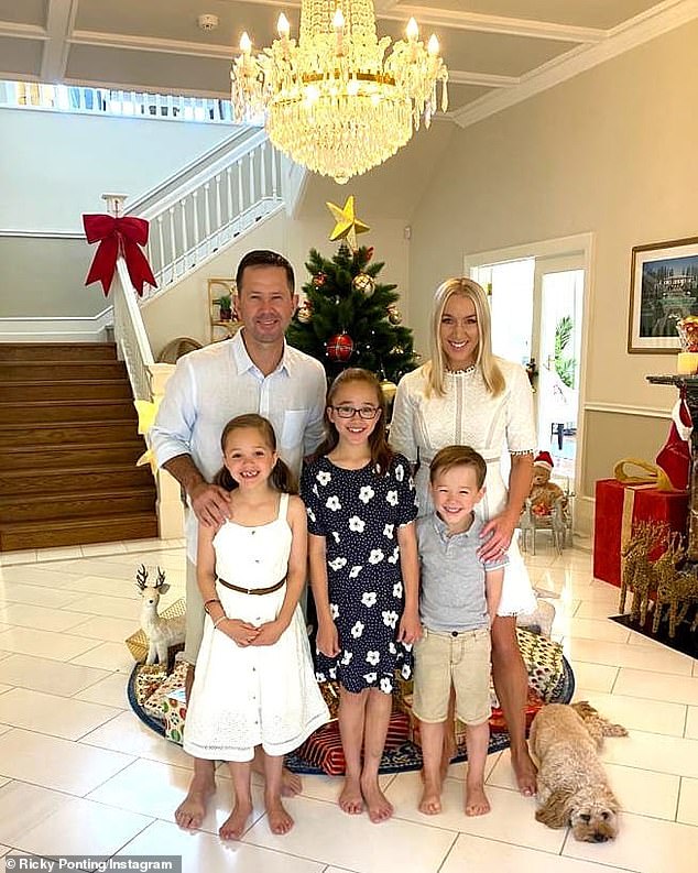 Ponting (pictured with his family) described standing by his son