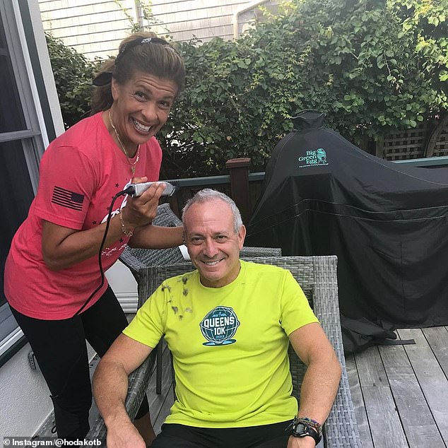 Having fun: Hoda ended the day by giving her fiancé an at-home haircut. In the snapshot that she shared, she can be seen buzzing Joel