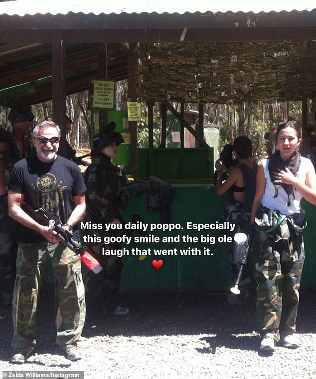 Sweet: She capped off the post with a sweet throwback of her and Robin going paintballing. 