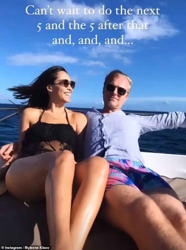 Adorable: One image showed Myleene and Simon enjoyed a boat ride during a recent romantic getaway