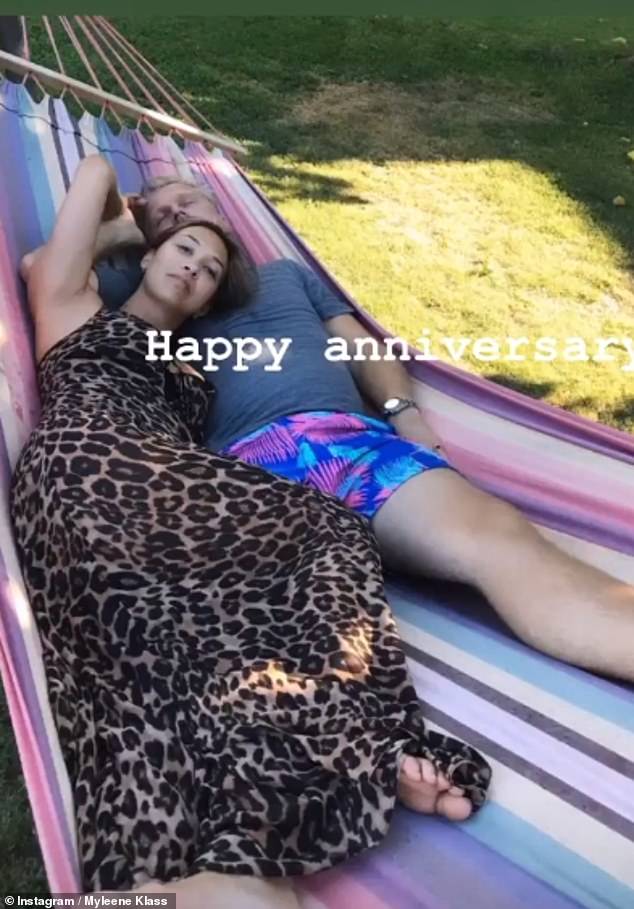 Sweet: One snap showed Myleene and Simon relaxing together on a hammock as she shared a collection of snaps documenting their romance
