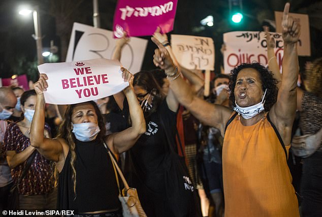 Marchers in Tel Aviv on August 20 demand justice for a 16-year-old who was allegedly gang-raped in a hotel in Eilat, southern Israel
