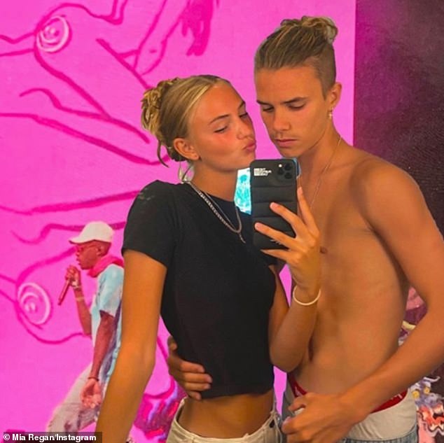 Summer love: Romeo Beckham posed for a snap with his girlfriend Mia Regan, on Saturday as they continue their love-filled summer