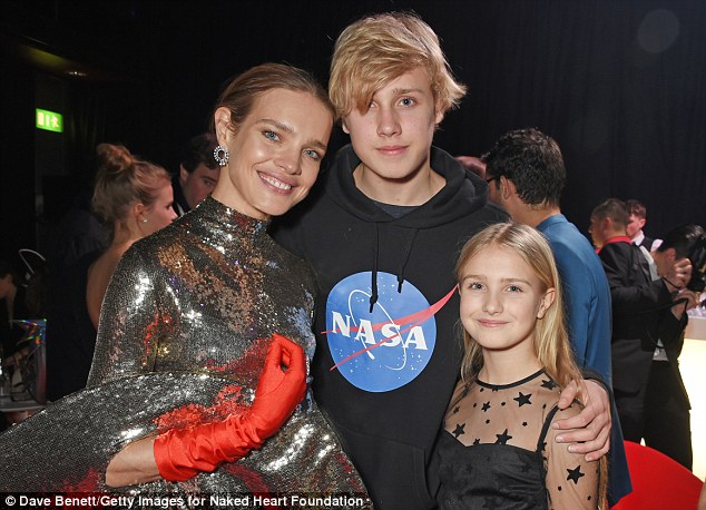 Good genes: Model Natalia Vodianova (left) posed with her children Lucas, 16, and cute mini-me Neva, 11, on Tuesday night, after hosting another successful Fabulous Fund Fair in London