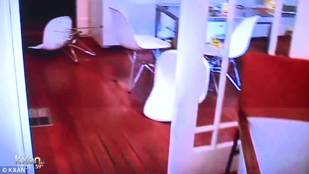 This picture is a video grab of the crime scene that saw furniture ending up on its side 