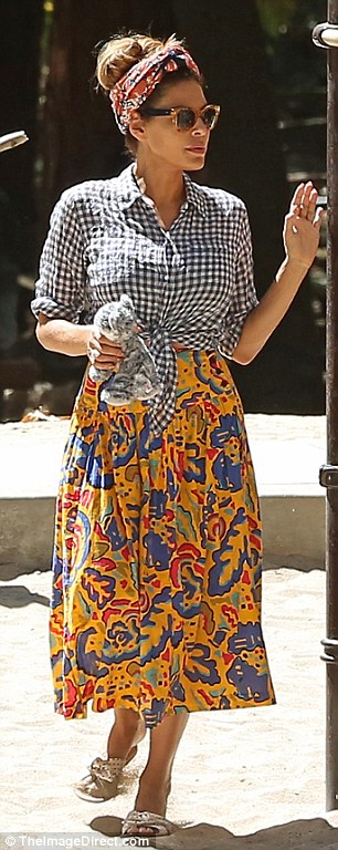 Stunning: Eva looked pretty in an entirely patterned look including a gingham top tied up at the end