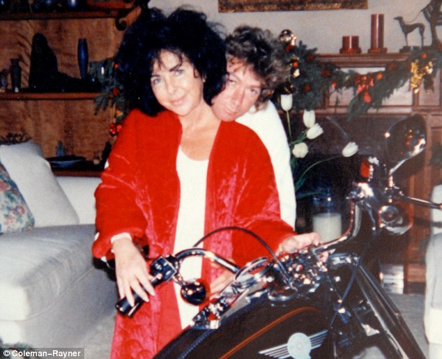 Elizabeth with Larry and his Harley-Davidson Christmas present in 1992
