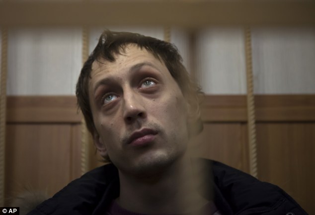 Confession: Bolshoi soloist Pavel Dmitrichenko, pictured in court last week,  has admitted to 