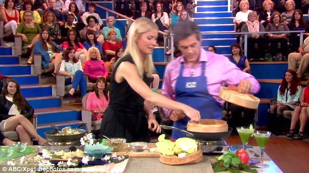 Showcase: Gwyneth shows Dr. OZ what a dab hand around the kitchen she is
