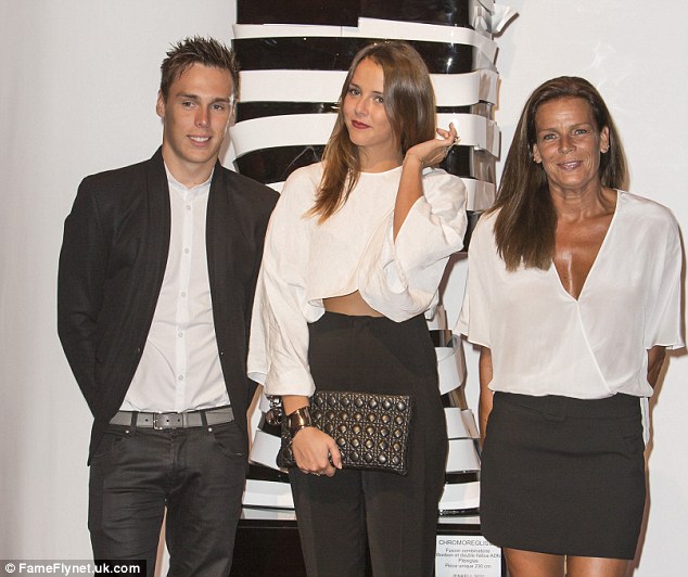 Sharp style: The family opted for a sharp monochrome style and all had impressive golden glows