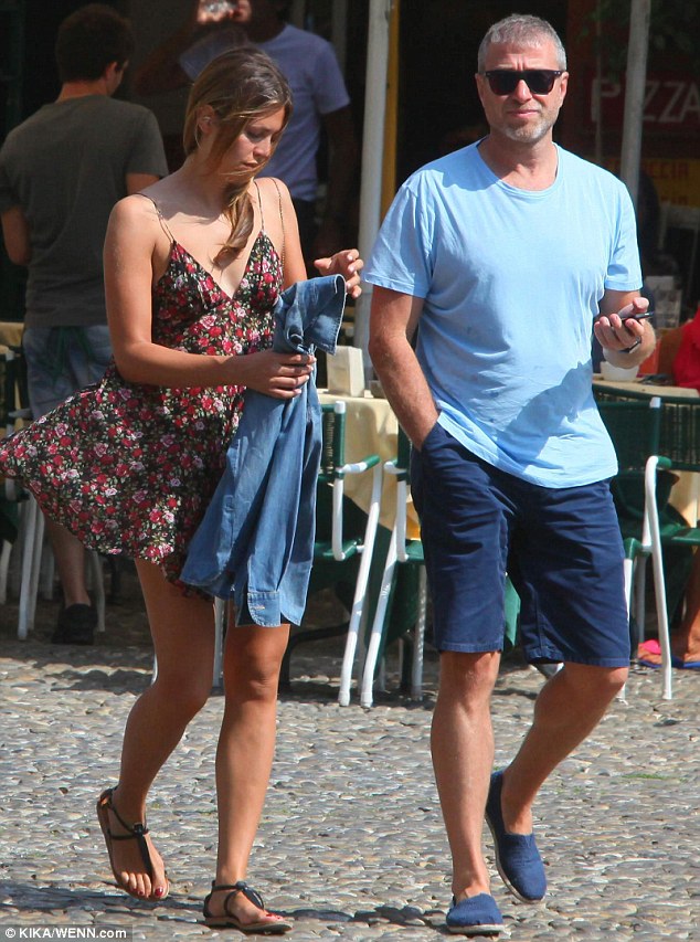 Fun in the sun: Dasha Zhukova took things back to basics as she stepped out in a pretty floral sundress while enjoying a romantic minibreak with Roman Abramovich in Portofino on Monday