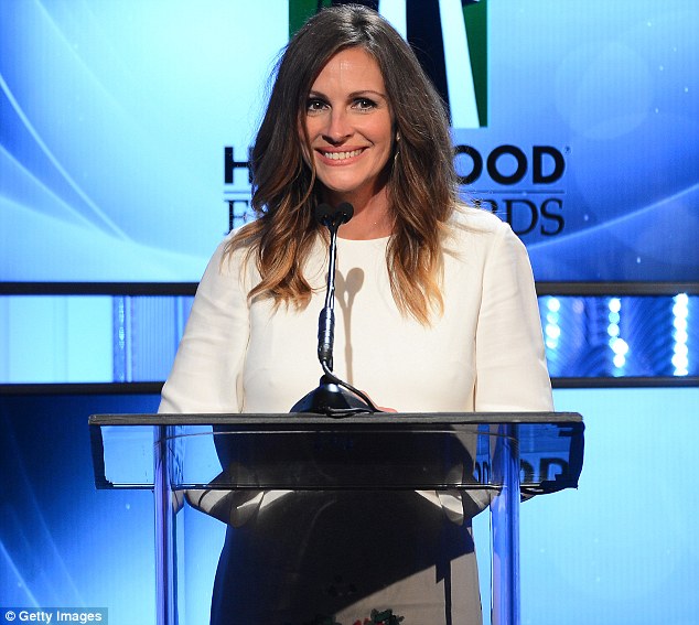 A little romance: Julia Roberts told her husband she loved him during her Supporting Actress Award acceptance speech at the Hollywood Film Festival on Monday night