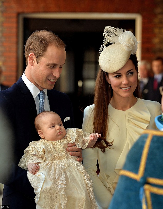 Big day: George wore an ivory gown made of delicate Honiton lace and white satin, worn before him by every baby born to the British Royal family since 1841
