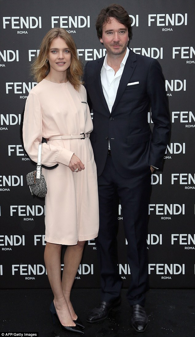 Expectant parents: Ms Vodianova is expecting her first child with billionaire boyfriend Antoine Arnault - here the couple, who have been dating for two years, are pictured in July