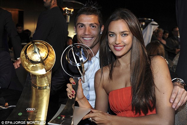 Close: Real Madrid footballer Cristiano Ronaldo with his girlfriend Irina Shayk during the Globe Soccer Awards ceremony in Dubai, UAE, in December 2011