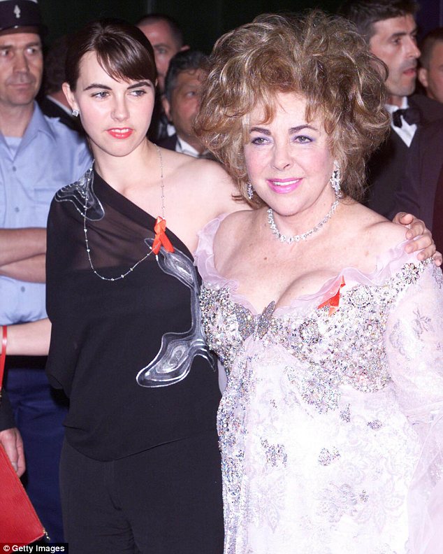 Side-by-side: Ms deLuce Wilding (left) lived with her grandmother for three years in her Los Angeles home (pictured, at an amFar fundraiser in Canned in 2001)