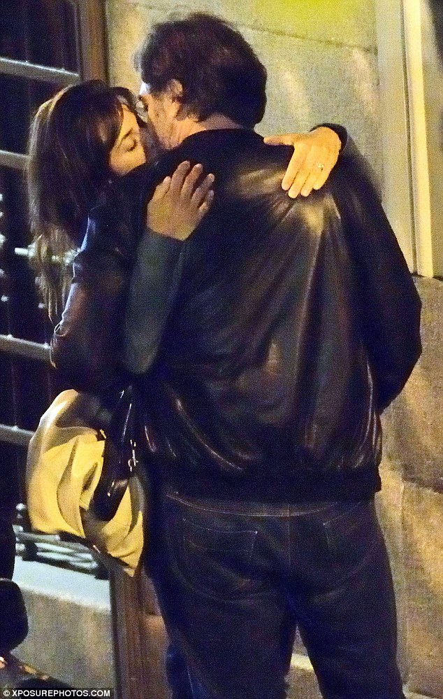 Steamy: Penelope Cruz and Javier Bardem looked to still be in the honeymoon period of their relationship on Wednesday as they were seen involved in a passionate PDA