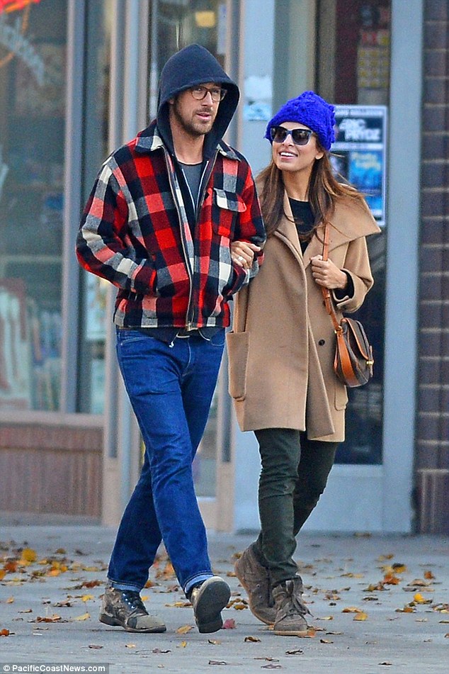 Low key: Eva and actor Ryan, who have been dating since September 2001, are a notoriously private couple, preferring to keep their personal lives under wraps - pictured in NYC when Eva was expecting