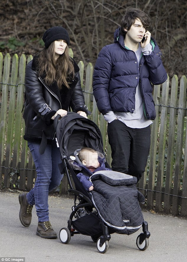Happy families: Keira Knightley and James Righton looked blissful as they took their baby daughter Edie for a stroll through a London park on Tuesday