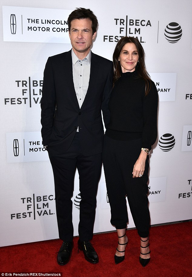 Dressed alike: Jason Bateman directed the movie and co-stars in it with Nicole. He arrived with his wife Amanda and the couple each chose black ensembles for their big night