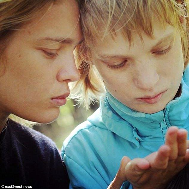 Anger: Mrs Vodianova (left, with Oksana) was appalled at how Owen, who is believed to have volunteered for the Special Olympics, mocked people with special needs