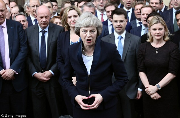 Prime Minister Theresa May used the hang signal after Andrea Leadsom pulled out of the Tory leadership contest outside the Houses of Parliament on July 11