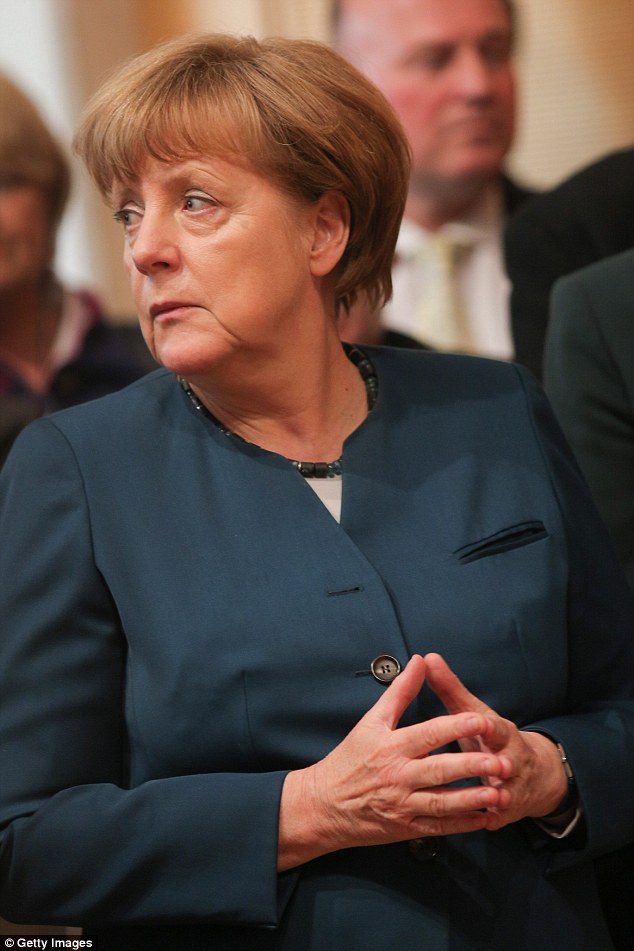 Mrs Merkel attended an event in Berlin on April 12 where she used the gesture again