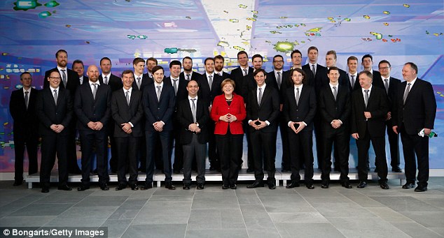Mrs Merkel used the hand gesture again on March 9 in Berlin