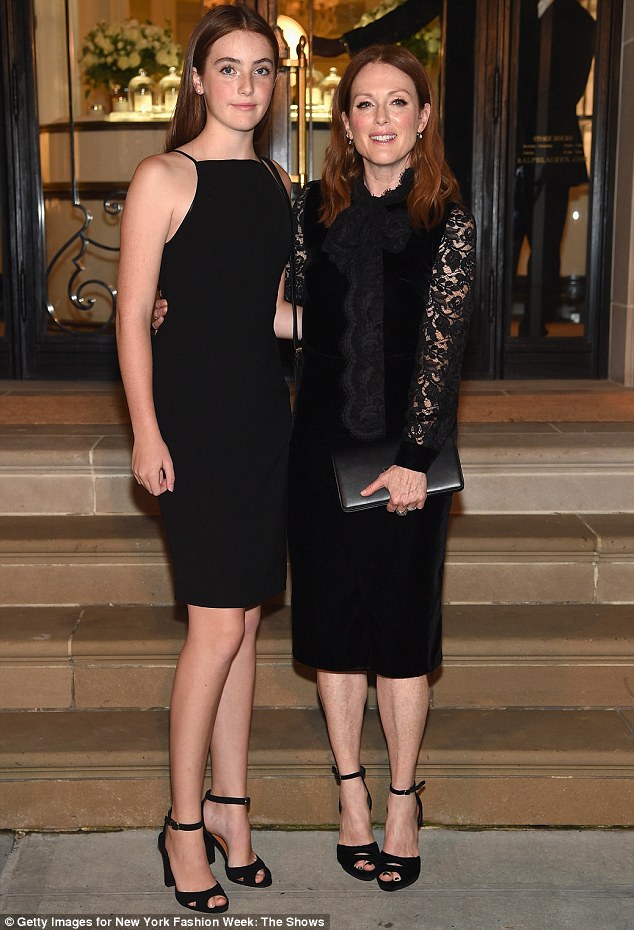 Like mother like daughter! Liv Freundlich looked the replica of her stunning mum Julianne Moore as they attended the Ralph Lauren show during New York Fashion Week on Wednesday