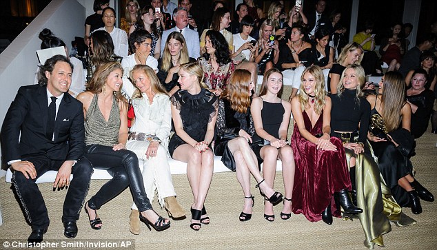 Star studded FROW: Julianne and her daughter sat alongside beauties Rosie Huntington Whiteley and Jessica Alba