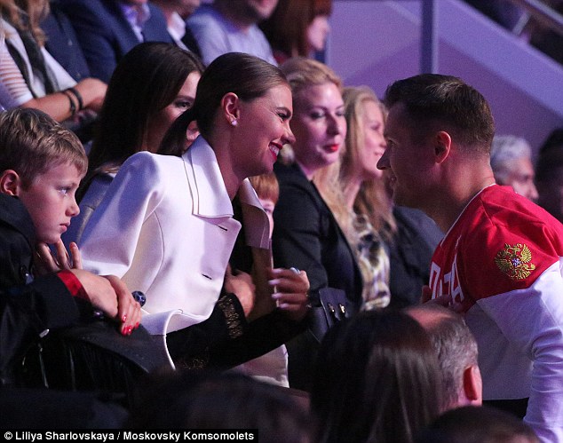 One source present at the event said Alina Kabaeva wore a wedding ring, but tried to cover her hand to hide it in pictures