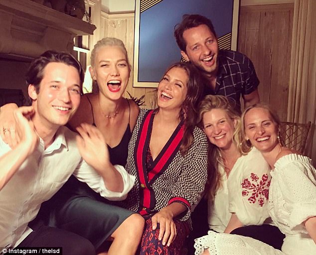 Another friend shared a photo of a laughing Dasha (centre) with friends including model Karlie Kloss (second from the left) two days ago during a meet-up in the Hamptons