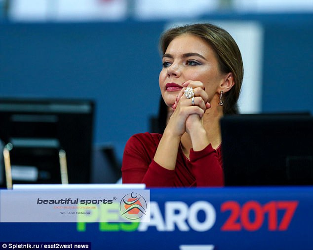 Glamorous Alina Kabaeva, 34, an Olympic gold medal winner in the Russian gymnastics team, wore the white gold band on her ring finger at an appearance in the Adriatic resort of Pesaro