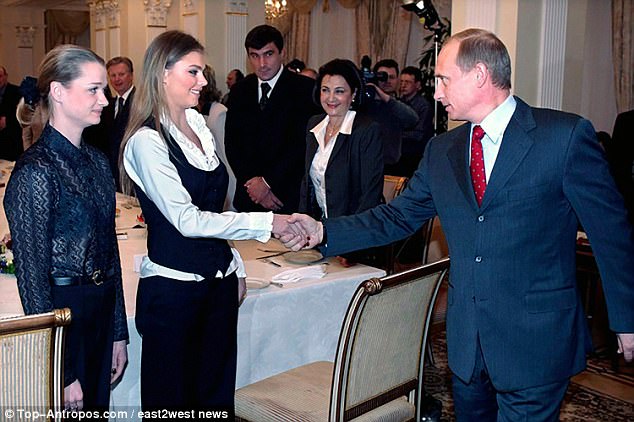 Alina Kabaeva and Vladimir Putin at a previous event at the Kremlin headquarters in Moscow