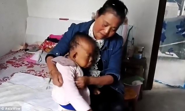 Ms Chu is the sole carer of Wang Tianfang. The part-time cleaning lady has to give him around-the-clock care, from dressing him up in the morning to feeding him food at meal times