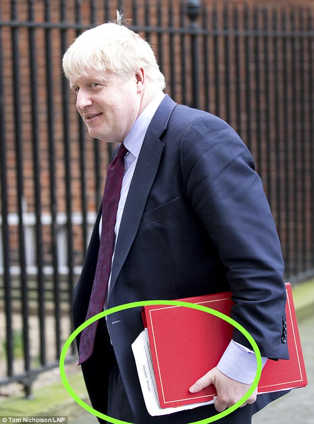 Boris Johnson narrowly avoided a blunder as he left Downing Street today - with the top of a document marked 