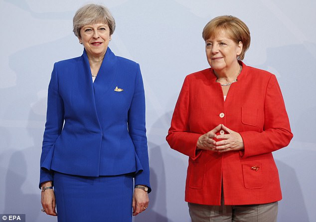 Mrs May and Mrs Merkel, pictured together at the G20 summit in Hamburg last year, are thought to have had fractious exchanges over Brexit