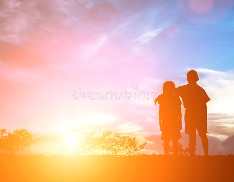 Brother and sister to cheer. On a beautiful day, Silhouette conc. Ept royalty free stock photography
