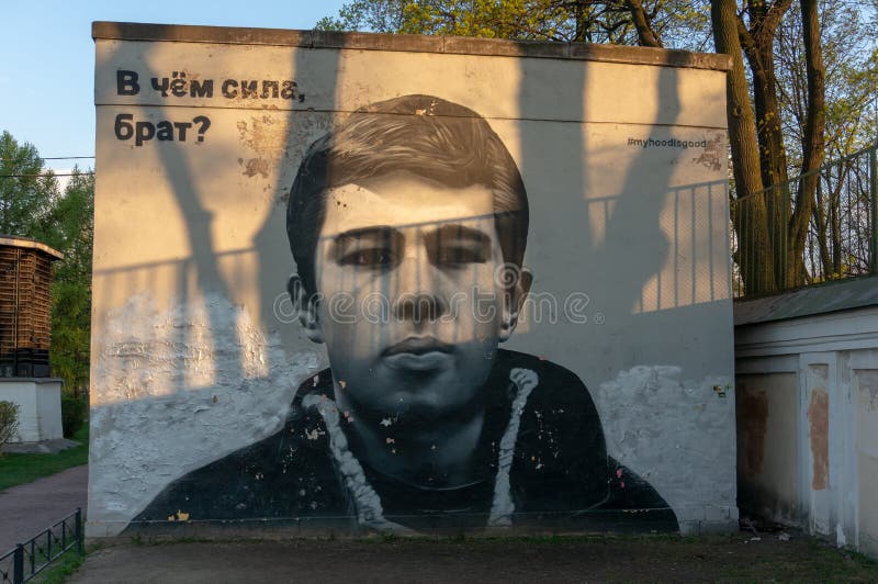 Graffiti with a portrait of Sergei Bodrov. Near the Alexander Nevsky Lavra. Graffiti of memory to actor Sergey Bodrov stock image