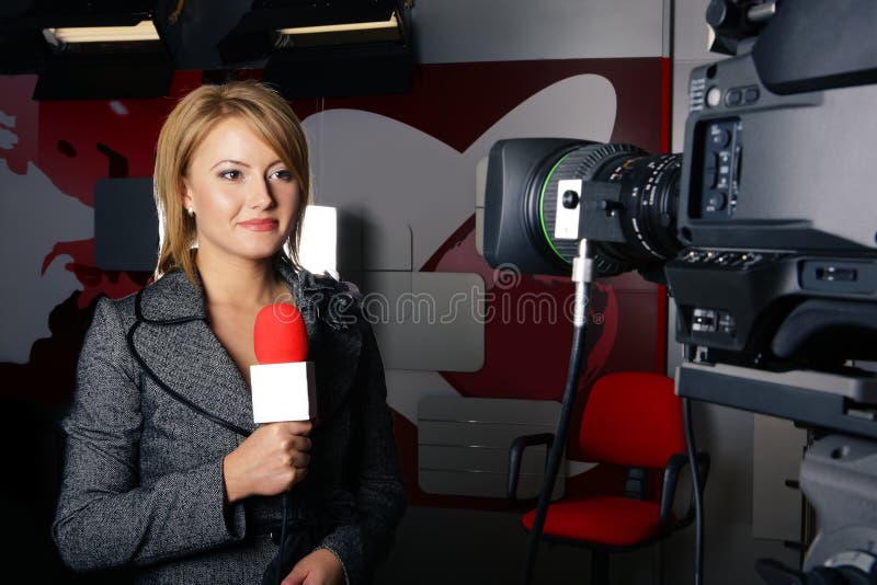 Real reporter with braking news smiling royalty free stock image